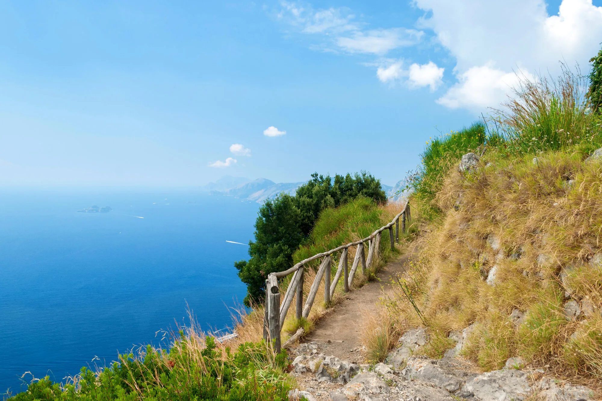 The coastal Path of the Gods trail winding above the Tyrrhenian Sea on the Amalfi Coast