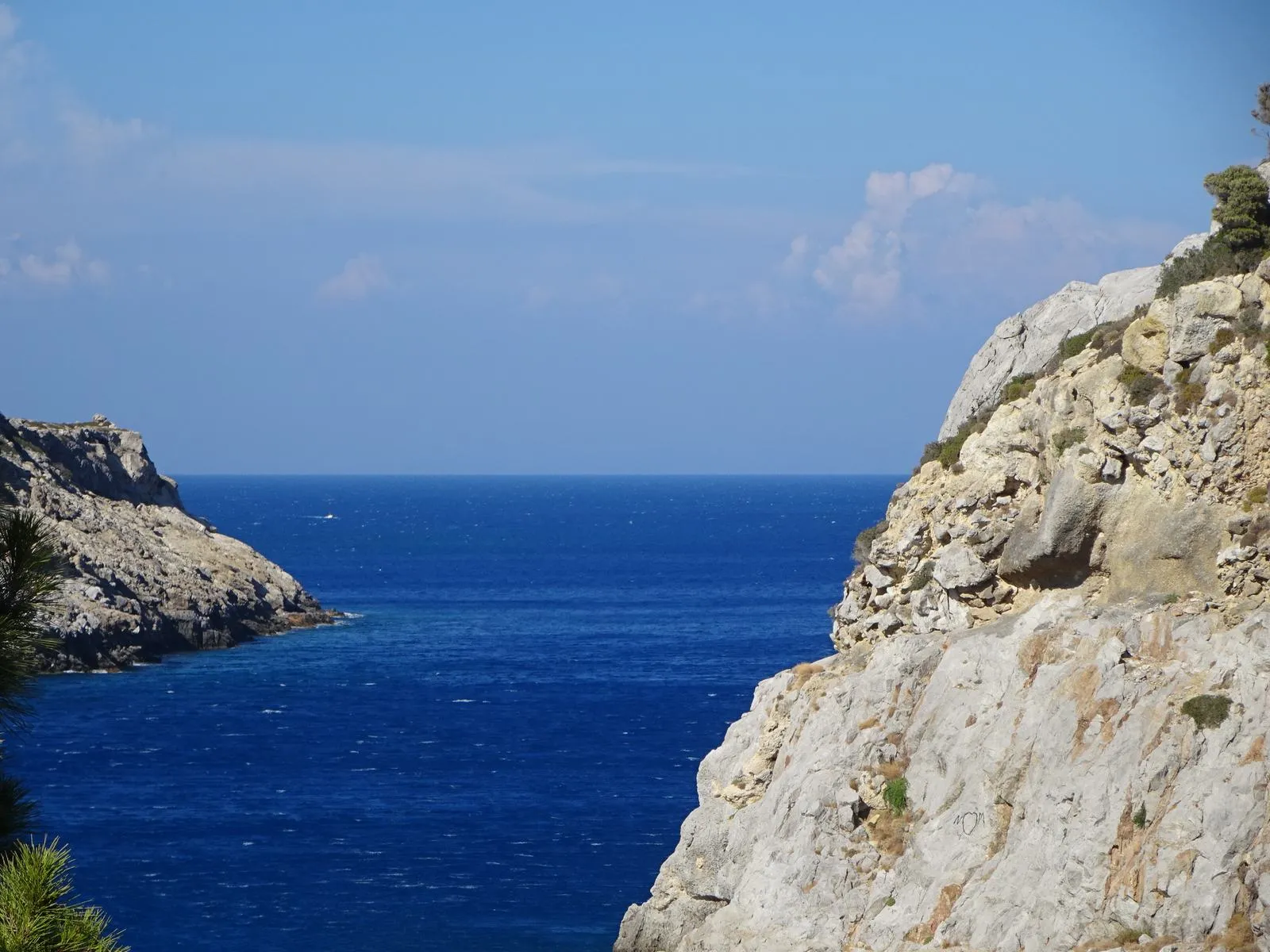 The clear turquoise water of Anthony Quinn Bay on the east coast of Rhodes, Greece