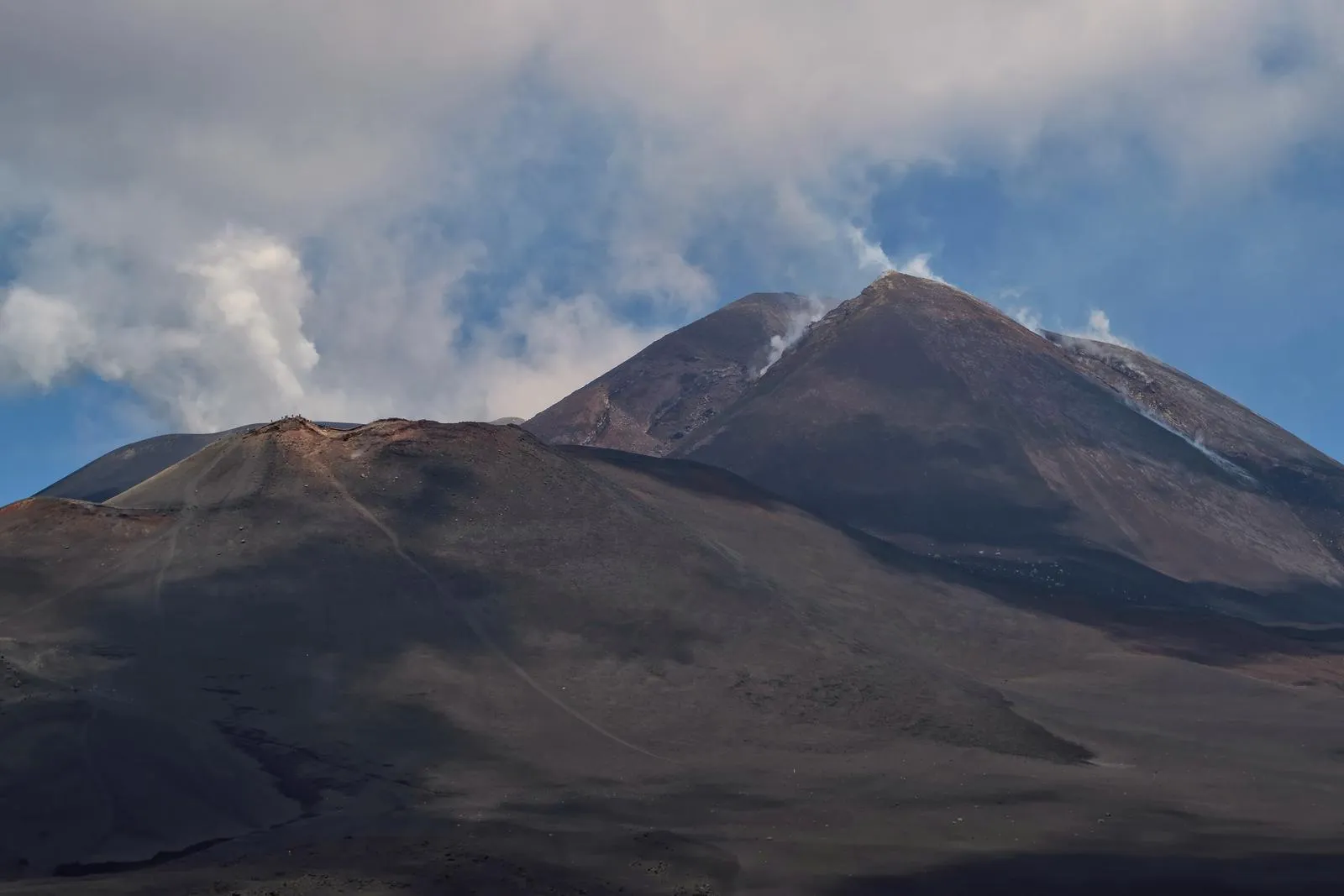 The summit craters of Mount Etna seen from the Laghetto crater in Sicily